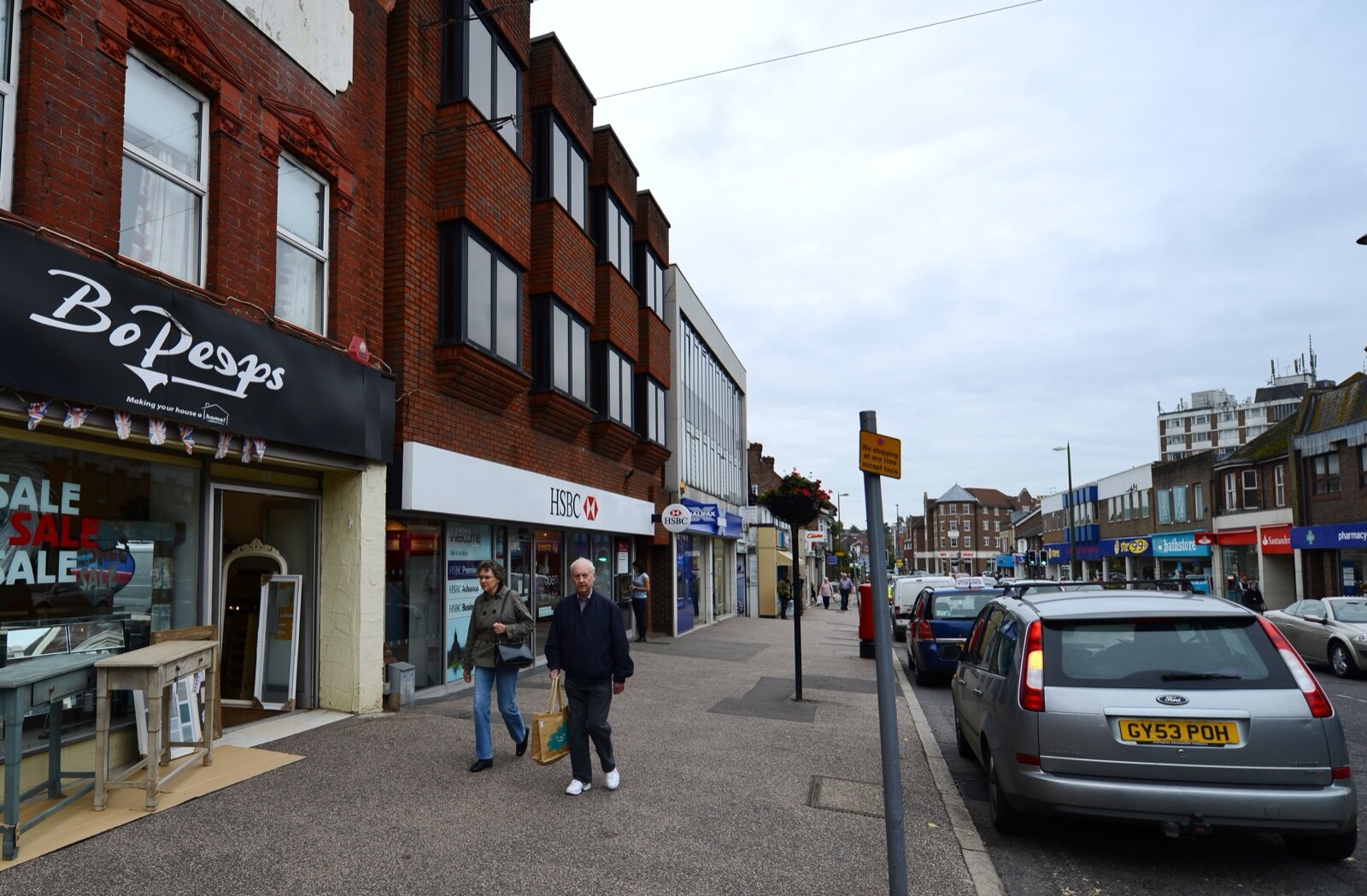 Shops and pedestrians on South Road in Haywards Heath town centre