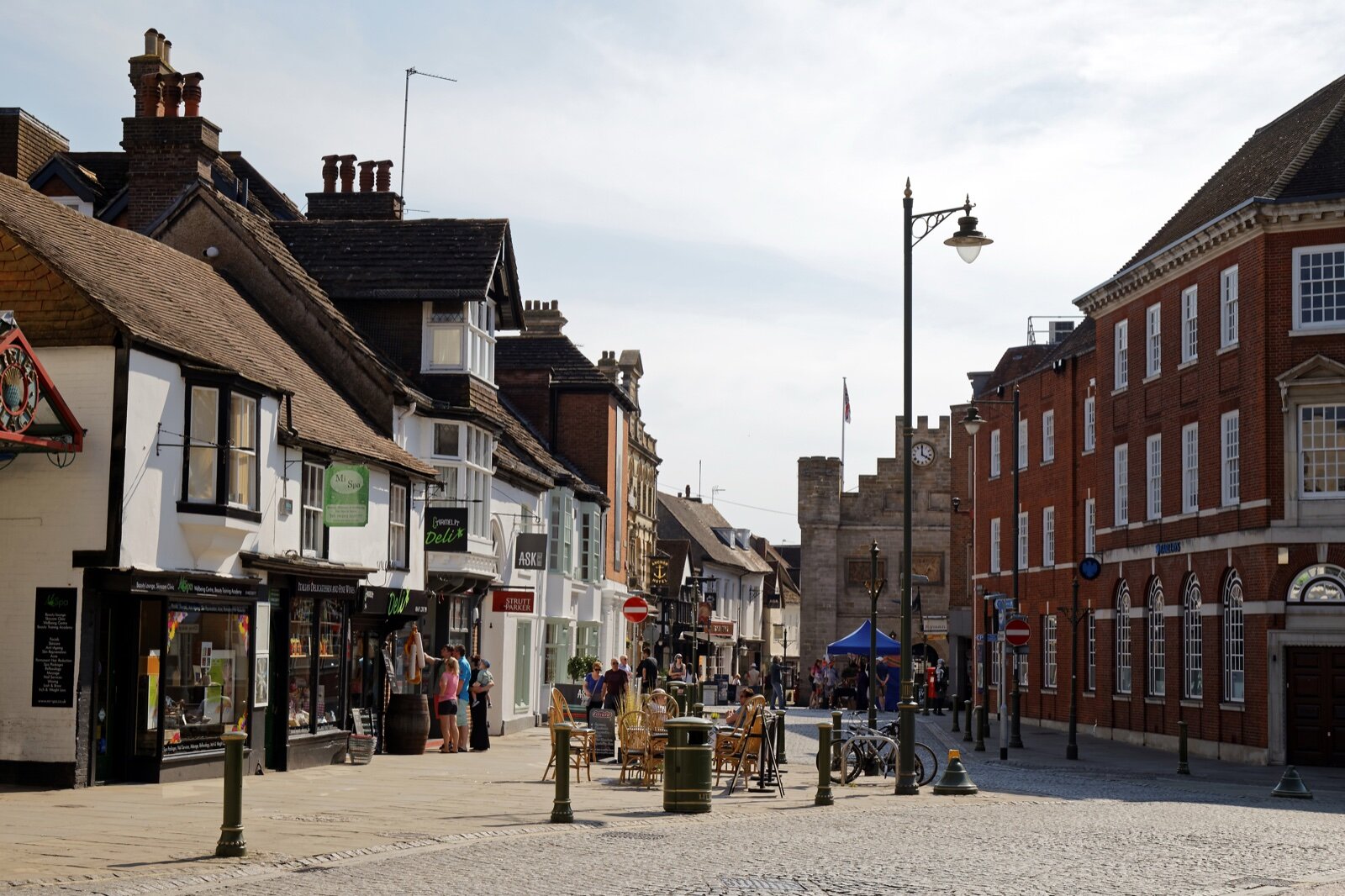 The Carfax in Horsham town centre, with timber-framed and brick shopfronts along a pedestrianised street
