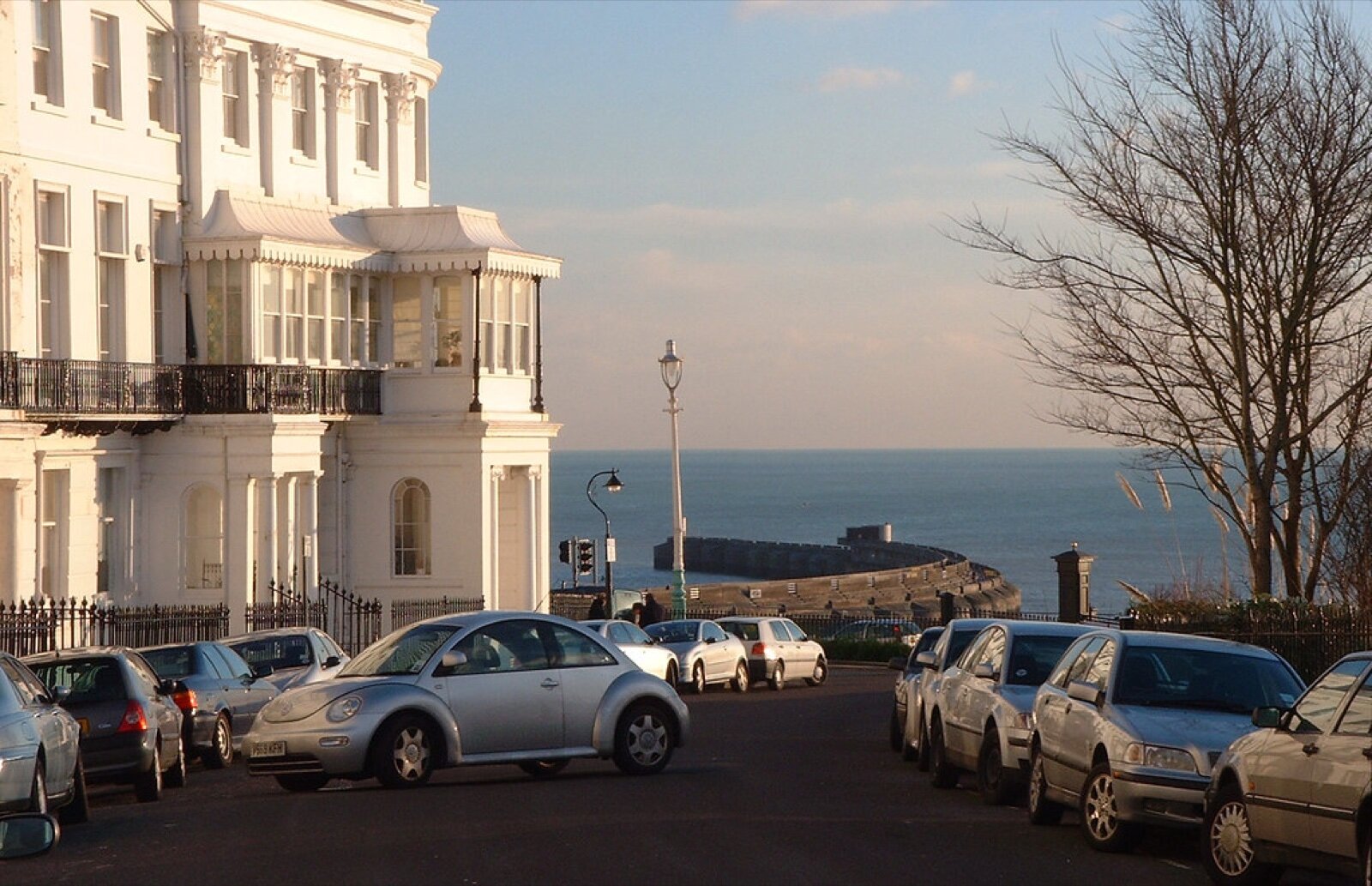 A Regency terrace on a Brighton hill with the sea and marina beyond